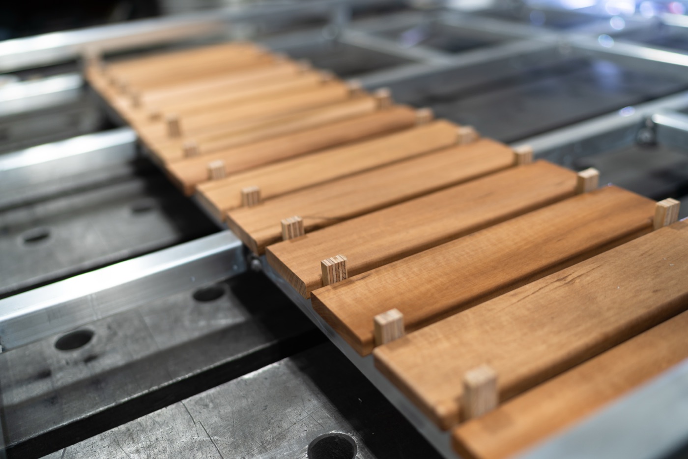 Tigerwood slats fitted into the aluminum roof rack grid