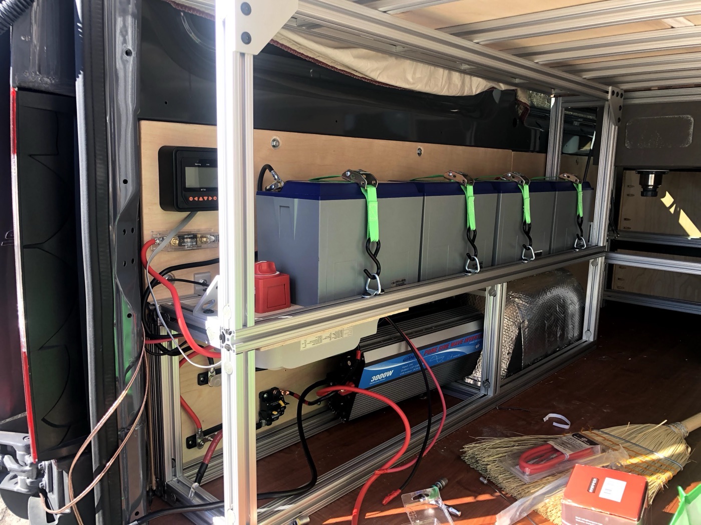 Full electrical bay — Battle Born batteries, inverter, and charge controller installed